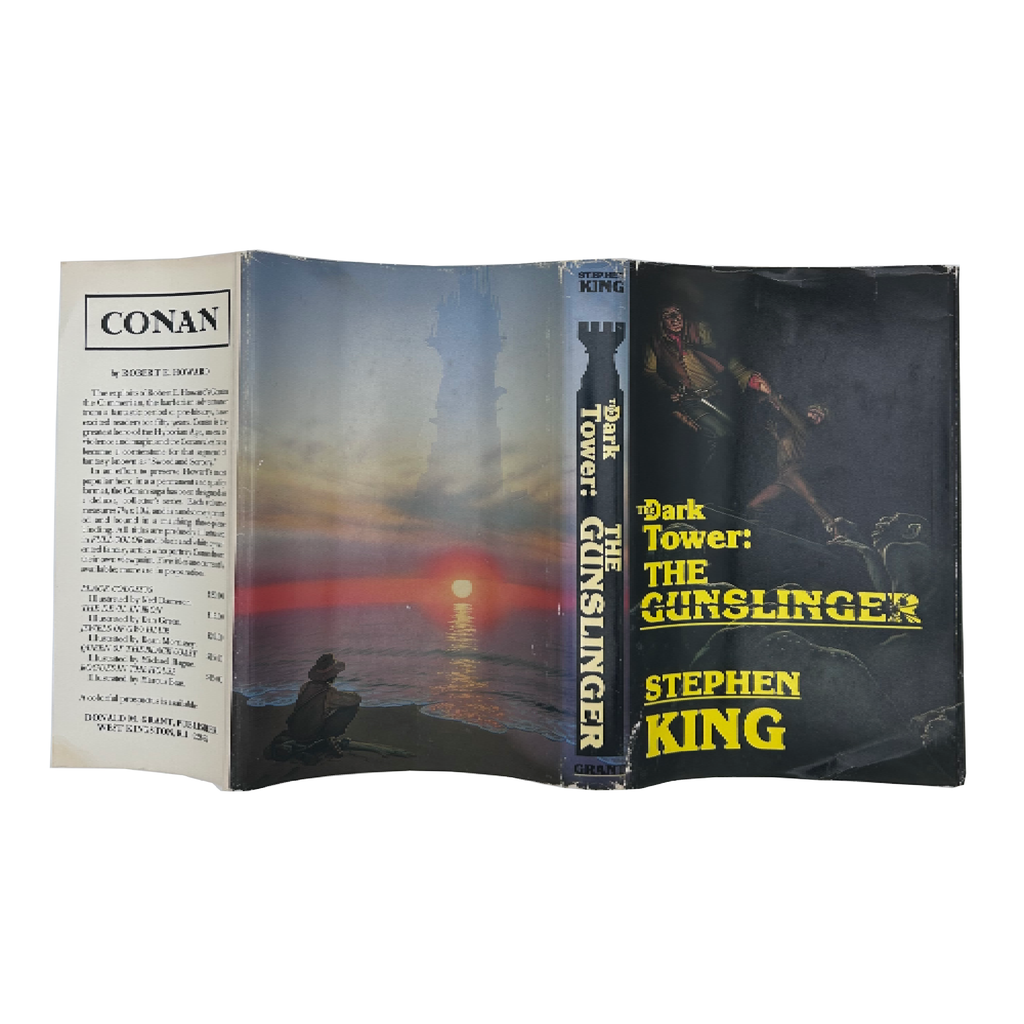 Open book displaying the cover of 'The Dark Tower: The Gunslinger' by Stephen King.